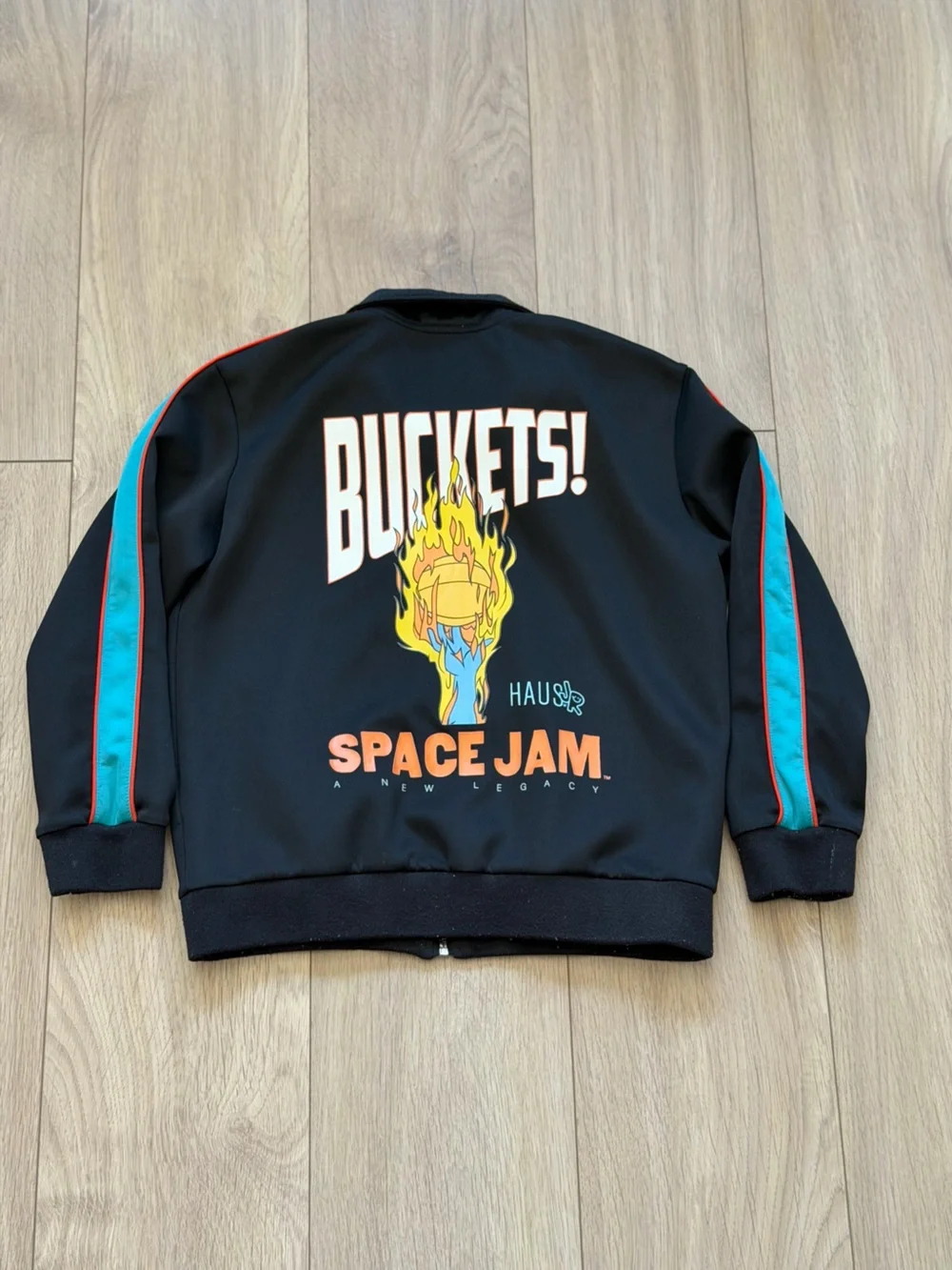 Kids Black Zip-Up Jacket with Blue Shoulder Panels -